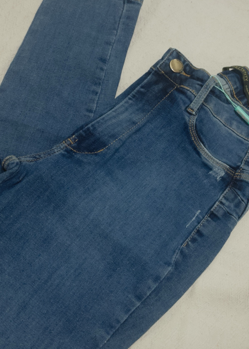 calça skini na cor jeans (foto 2)